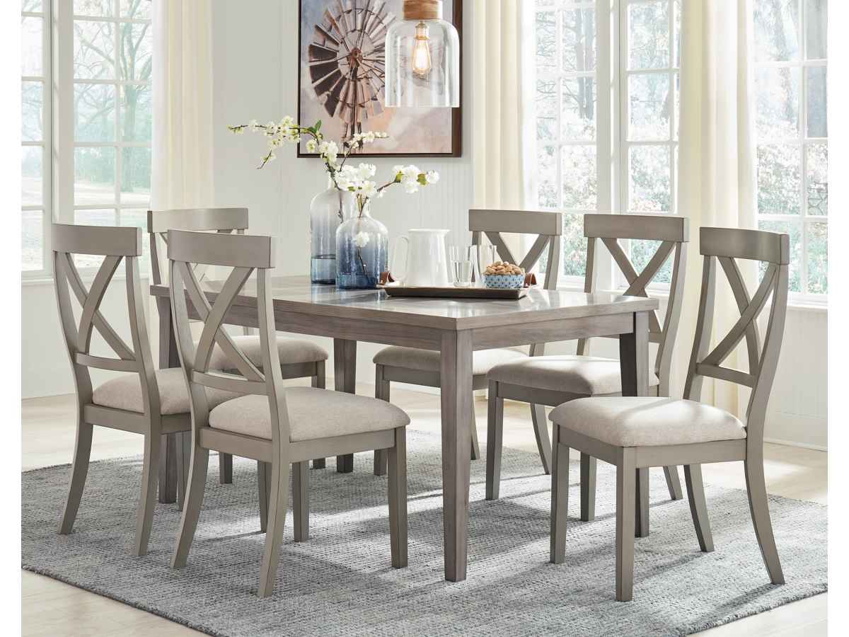 "Brand new gray finish table, accompanied by 6 dining chairs with light beige woven upholstery seat, displayed among other furniture in a warehouse showroom at a clearance center in Savage, MD."
